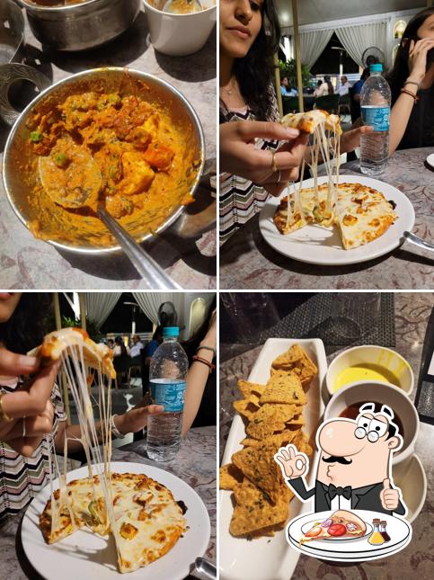 Pick pizza at Veggies - Veg Fast Food Restaurant