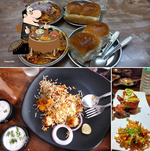 Meals at Hotel Mukund Plaza Bar and family Resturant