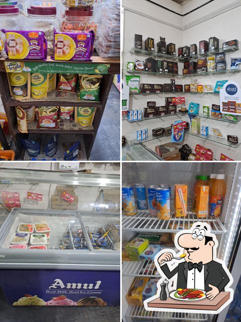 Check out the photo depicting food and interior at Tropical Garden