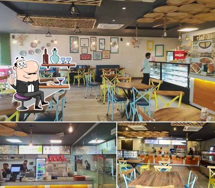 Take a seat at one of the tables at MOC The American Restaurant