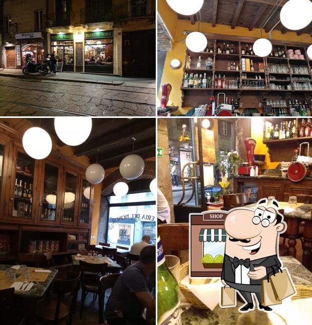 La immagine di esterno e tavolo da pranzo da Pizzeria Del Ticinese