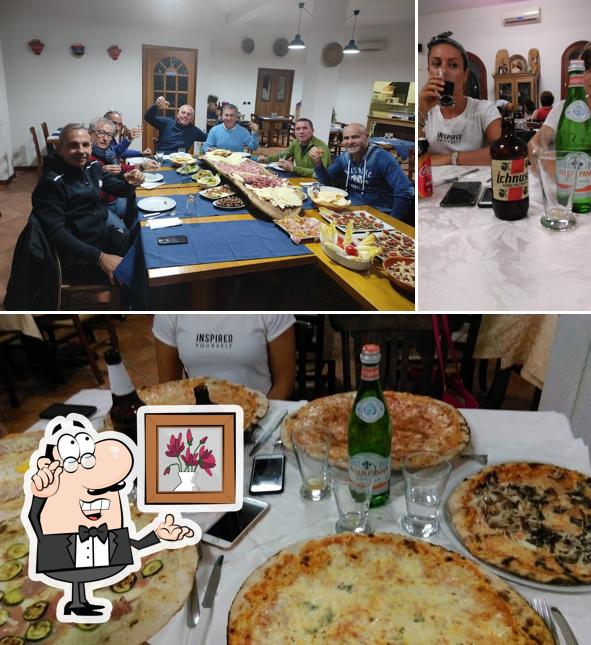 Guarda la foto che presenta la interni e birra di Pizzeria Zia Berta