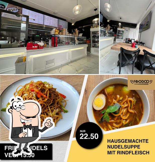 Voici la photo affichant la intérieur et nourriture sur Foodoo Asia Take Away