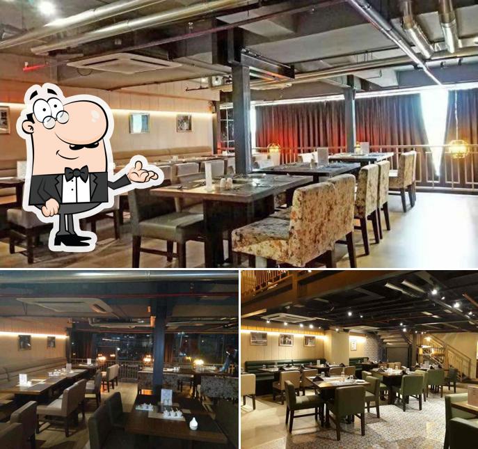 Take a seat at one of the tables at Moti Mahal Barbecues