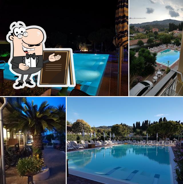 Puoi goderti l'aria fresca da seduto all'esterno di Hotel Delle Mimose