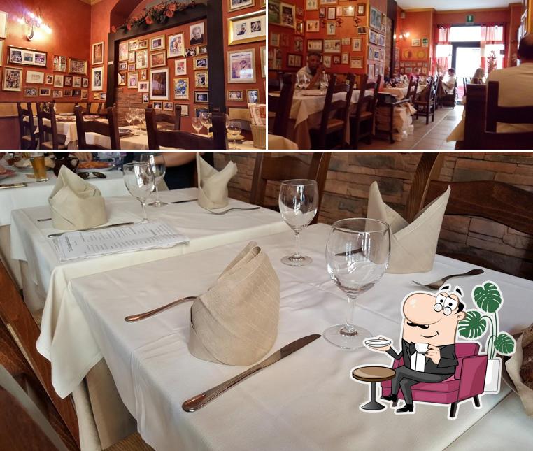 Siediti a un tavolo di La Locanda Dell'Amore