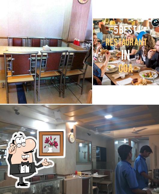 Take a seat at one of the tables at Trimurti