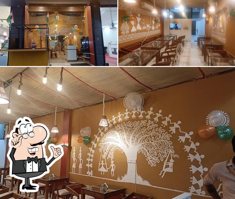 Take a seat at one of the tables at Desi Champaran Hut (DCH)