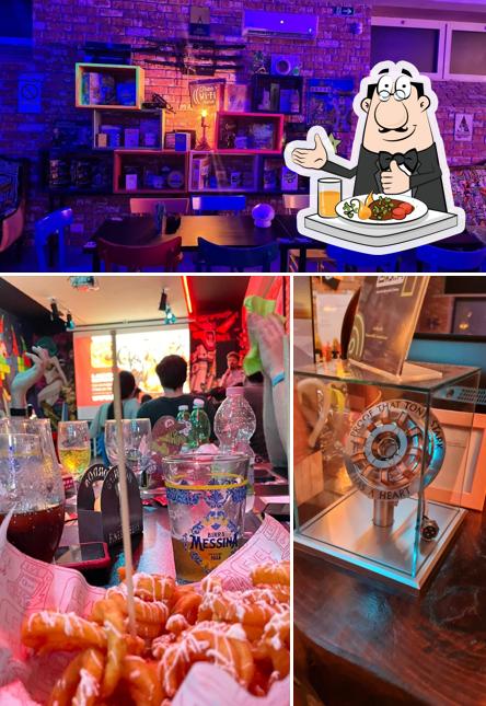 Guarda la foto che mostra la cibo e interni di Level Up Pub & Game