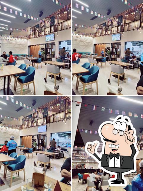 The interior of Godwit Cafe Best Cafes in Raipur Best Jain food in Raipur Pure Veg restaurant