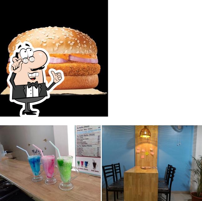 This is the picture depicting interior and food at Sai Cafe Katta