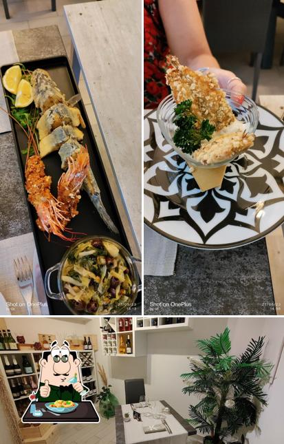 Questa è la immagine che presenta la cibo e interni di Kunsulà Questa è la immagine che presenta la cibo e interni di Kunsulà