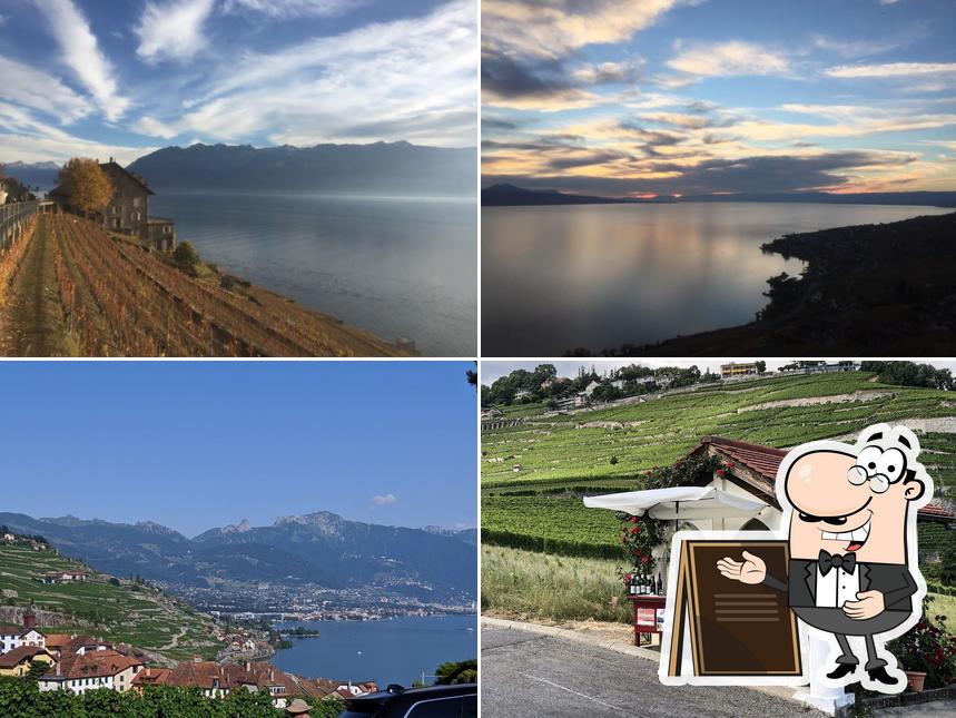 Puoi goderti l'aria fresca da seduto all'esterno di ''La Chapelle'' Vente de vins Didier Imhof
