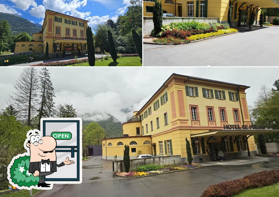 Puoi goderti l'aria fresca da seduto all'esterno di Hotel Le Prese