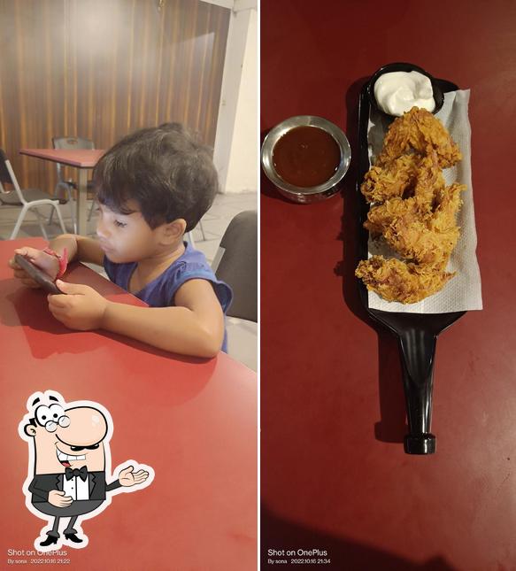 See this image of Mr. Fried Chicken- MFC Kurmannapalem, Hotel Samsan Residentia