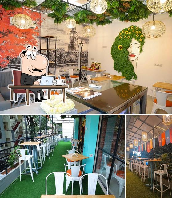 Take a seat at one of the tables at Peep in Cafe