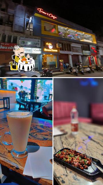 This is the image displaying food and exterior at Tom's Cafe