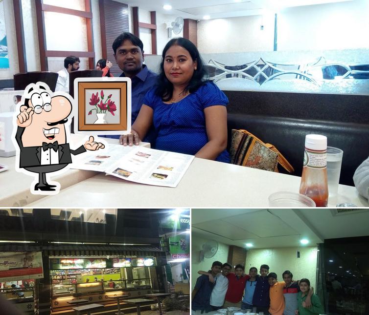 Take a seat at one of the tables at Harish Bakery