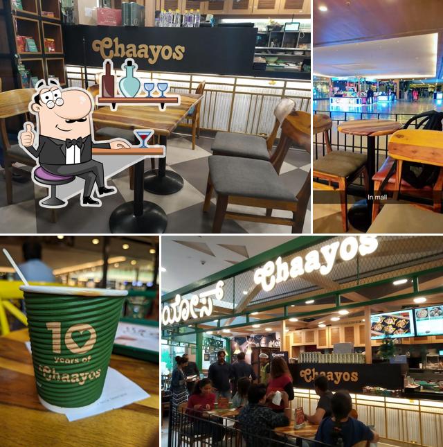 Take a seat at one of the tables at Chaayos Cafe at Orion Mall