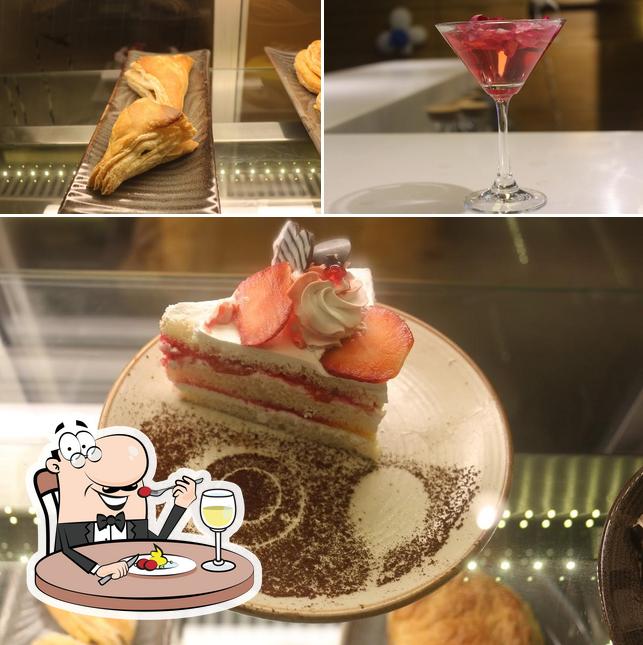 Among various things one can find food and alcohol at Delice Hotel