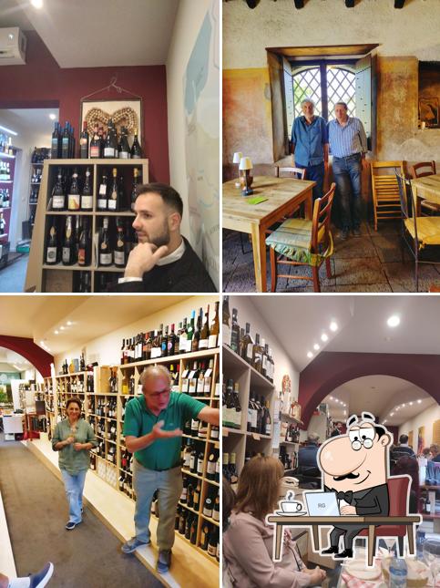 Dai un'occhiata agli interni di Enoteca Enoclub