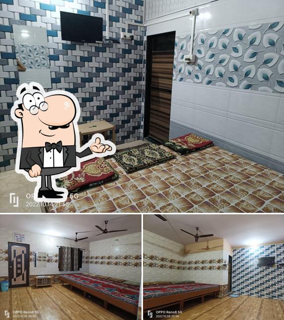 Take a seat at one of the tables at Saikrupa Cottage, Alibag