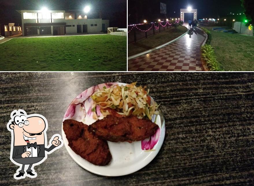 The image of Hotel Sangam’s exterior and burger