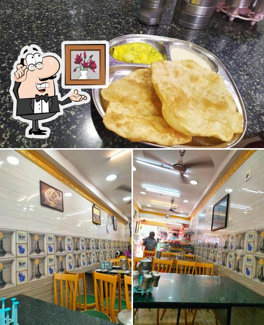 The photo of interior and food at Hotel Shri Lakshmi