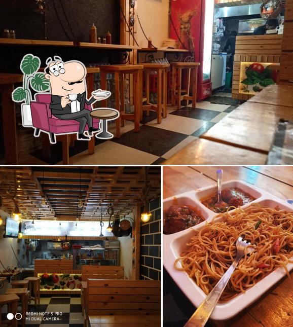 This is the picture displaying interior and food at Sandy sandwich