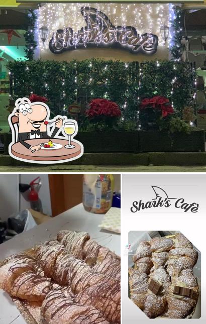 Questa è la foto che mostra la cibo e esterno di Shark's Cafè