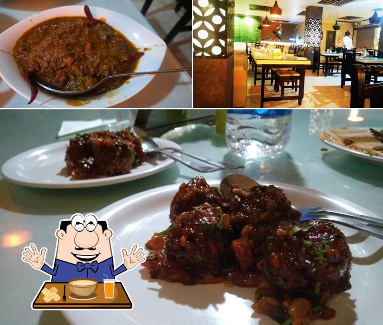 This is the picture displaying food and dining table at Hot & Sour