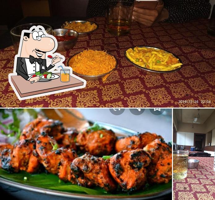 Among different things one can find food and beverage at Vijayraj Bar And Restaurant and Lodging