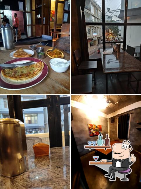 Take a seat at one of the tables at Jojos Cafe and Restaurant