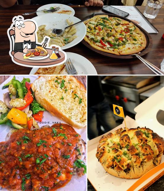 Pick pizza at Amigo's Café