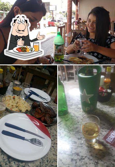 Entre diversos coisas, comida e interior podem ser encontrados a Barraca O Miraíma