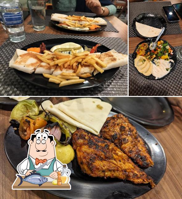 Grilled salmon at Tavuk Restro Eranhipalam