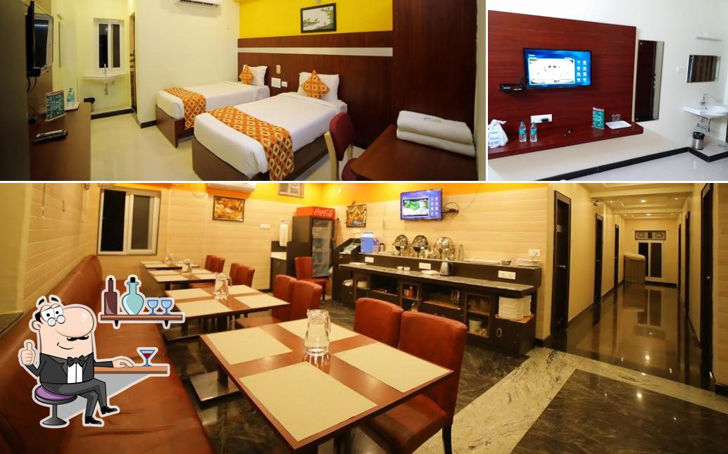 Take a seat at one of the tables at HOTEL RAMCHARAN RESIDENCY, TIRUPATI