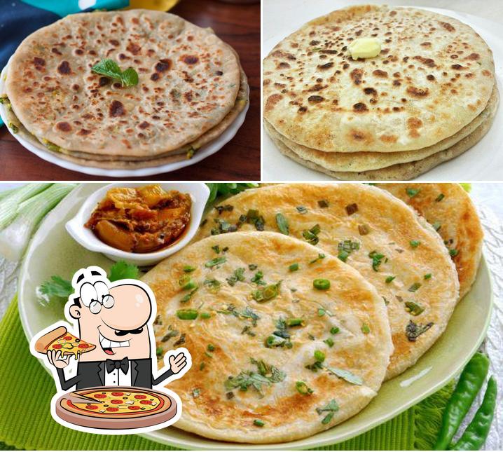 Pick pizza at Ashirwad Pure Veg Dhaba