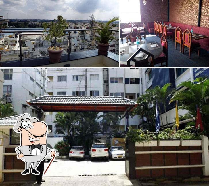 The photo of Hotel Pigeon International’s exterior and interior