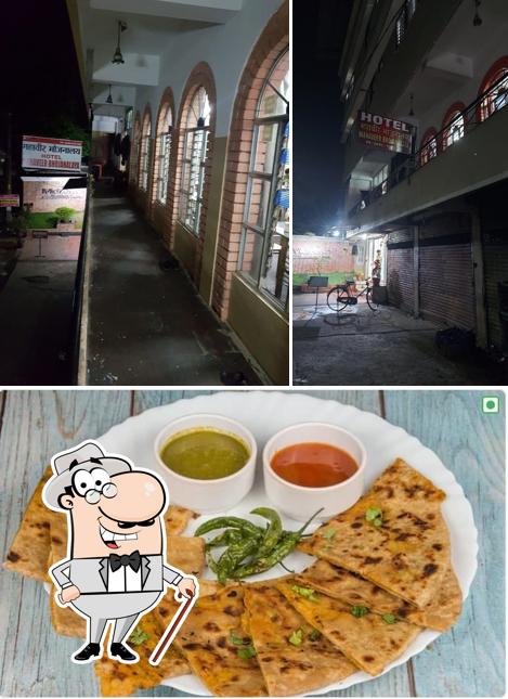 This is the photo depicting exterior and food at Mahaveer Bhojanalaya