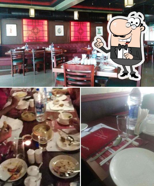 The image of interior and dining table at Chopstix