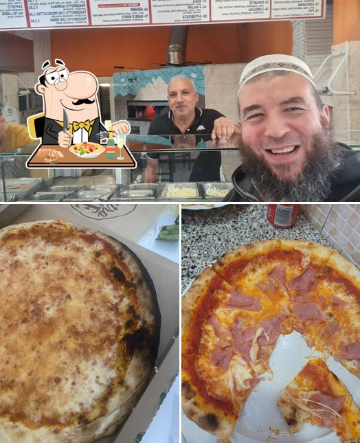 Questa è la foto che mostra la cibo e interni di Pizzeria Nuova oasi...Kebab