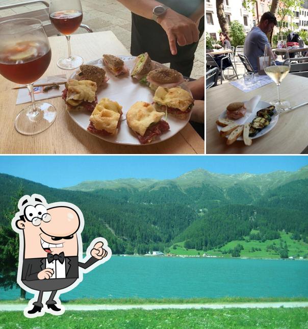 Puoi goderti l'aria fresca da seduto all'esterno di Al Prosecco