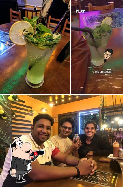 Check out the photo depicting drink and bar counter at TAKE a BREAK CAFE
