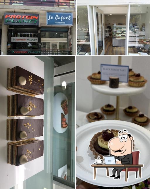 Take a seat at one of the tables at Le Coquet - The Fine Bakery