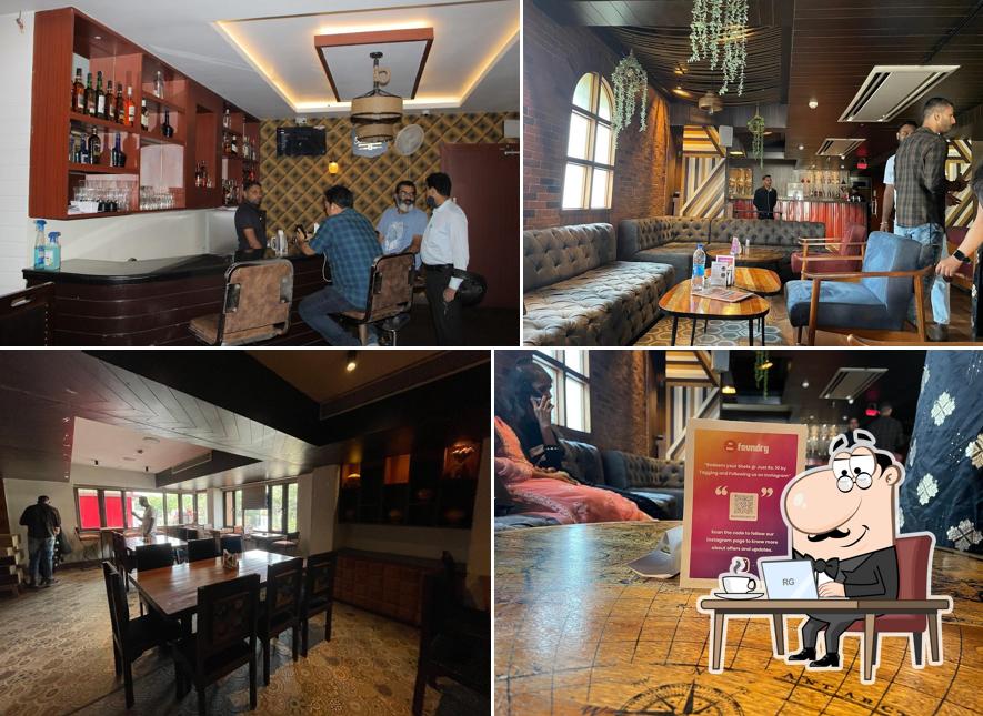 Take a seat at one of the tables at Universal Bar and Restaurant