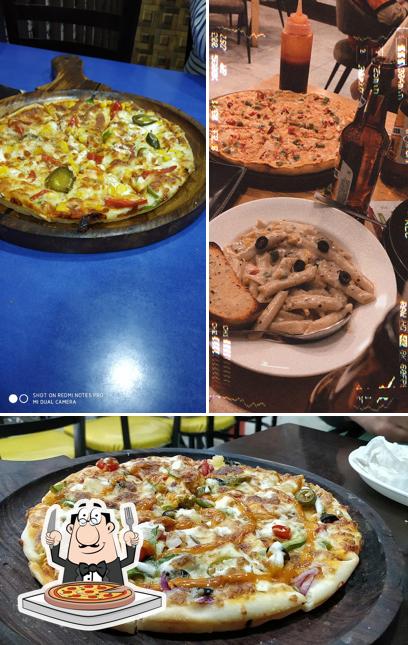 Get pizza at YUMMY BITEE