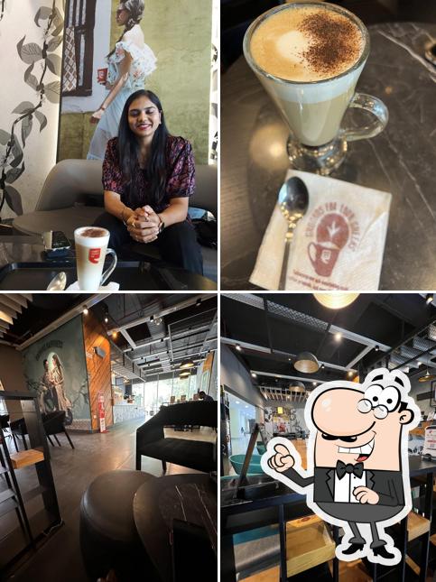 Among various things one can find interior and drink at Café Coffee Day