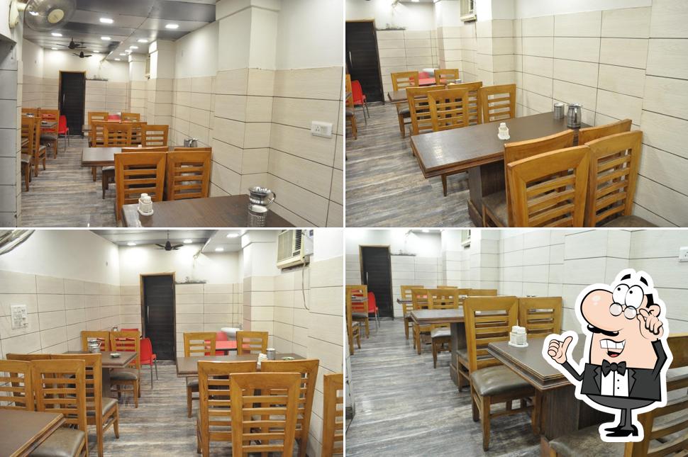 The interior of New Adarsh Dhaba pure .veg