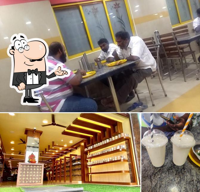 The photo of interior and beverage at Arya Nivas